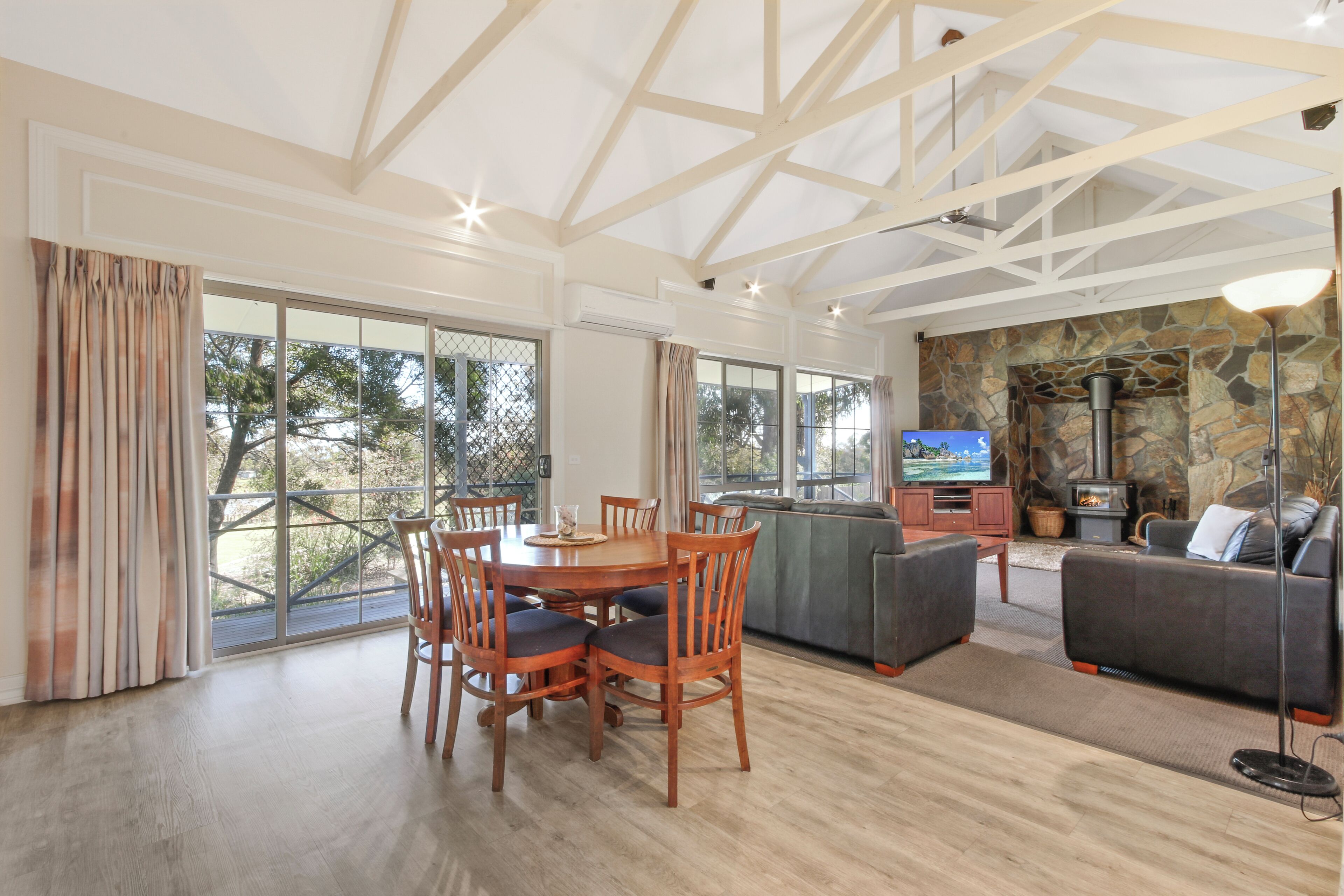 Two bedroom two bathroom cottage\-Bass | Living area | Flat-screen TV, DVD player, books