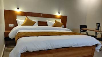 Deluxe Double Room, 1 Double Bed | Pillow-top beds, individually decorated, individually furnished, desk