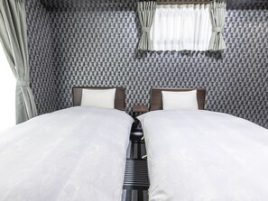 Chambre avec lits jumeaux, non-fumeurs | Bureau, Wi-Fi gratuit, draps fournis