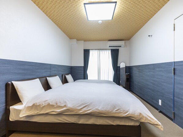 Driepersoonskamer, niet-roken | Een bureau, gratis wifi, beddengoed