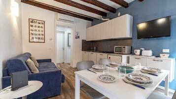 Basic Apartment, 1 Bedroom, River View | Living area | Flat-screen TV