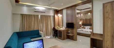 Suite Room | 1 bedroom, individually furnished, desk, blackout curtains
