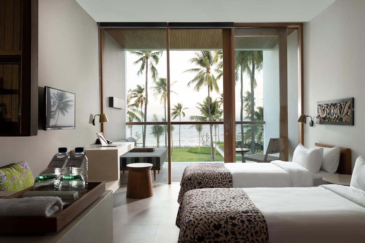 deluxe twin room, 2 single beds, ocean view | in-room safe, desk, blackout curtains, iron/ironing board