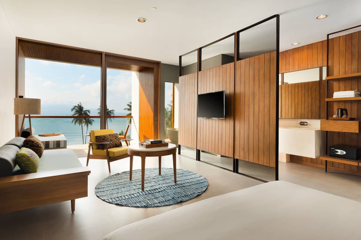 suite, ocean view | living area | led tv