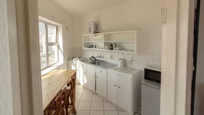 Lägenhet Classic - 1 dubbelsäng | Eget kök | Kylskåp, mikrovågsugn och grytor/köksredskap