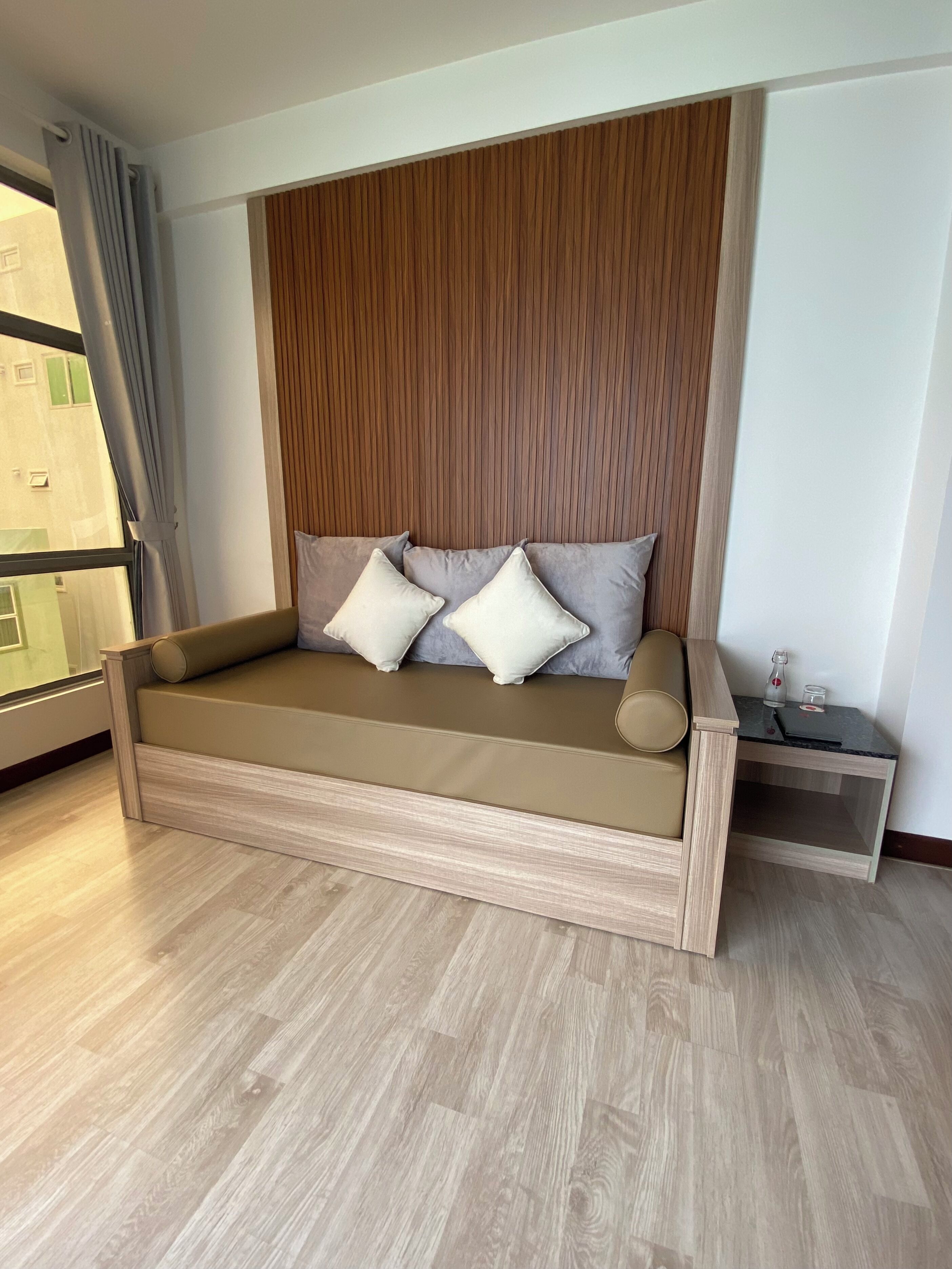 exclusive suite, 1 queen bed, ocean view, oceanfront | living area | flat-screen tv