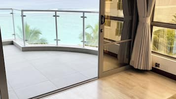 Paralian Suite | Living area | Flat-screen TV