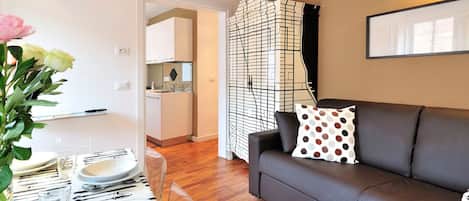 Apartment, 2 Bedrooms | Living area | 35-inch flat-screen TV with digital channels, TV