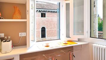 Apartment, 2 Bedrooms | Private kitchen | Full-sized fridge, microwave, stovetop, dishwasher