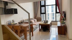 Deluxe Duplex | Living room