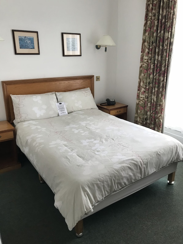 Desk, iron/ironing board, free wired internet, bed sheets