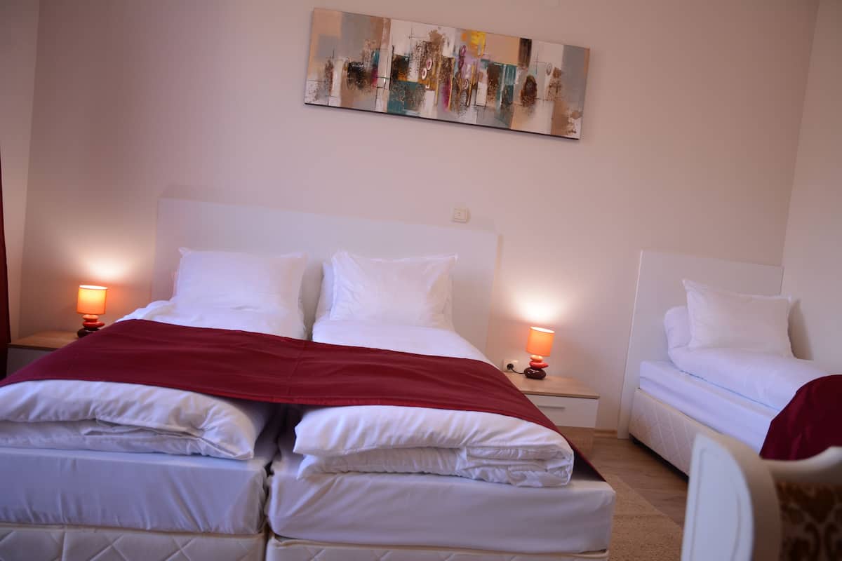 Family Triple Room, 1 Bedroom, Pool View, Poolside | Living area | Flat-screen TV