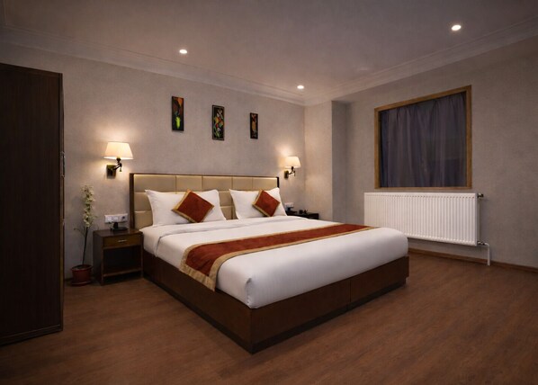 Camera Deluxe con letto matrimoniale o 2 letti singoli | Una scrivania, Wi-Fi gratuito, lenzuola