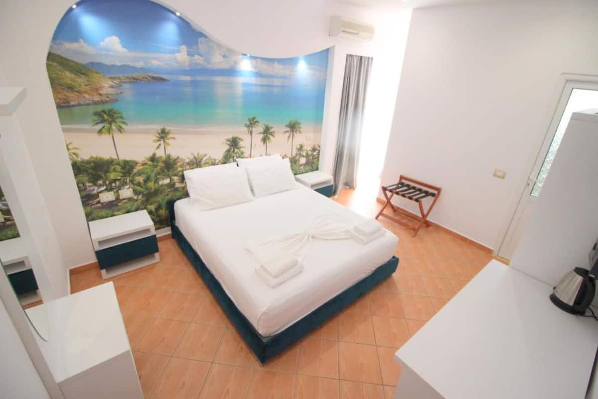 Deluxe Triple Room, Sea View | In-room safe, desk, soundproofing, iron/ironing board (on request)