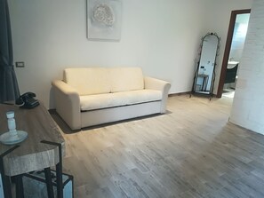 Quadruple Room, Garden Area | Living area | 18-inch flat-screen TV with digital channels, TV