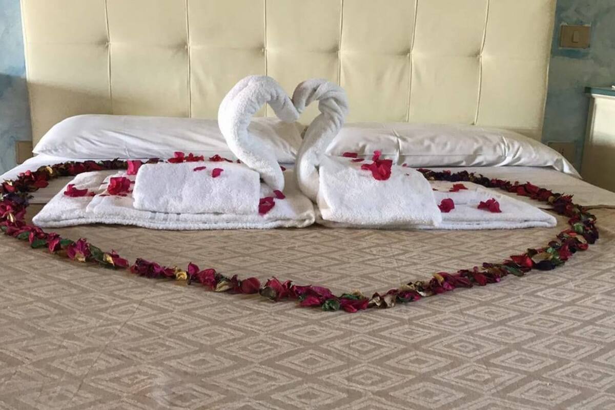 Triple Room | Desk, cots/infant beds, free WiFi
