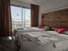 Minibar, wifi gratis y ropa de cama