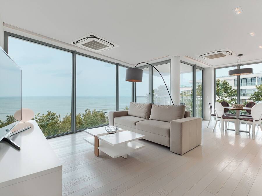 Deluxe Apartment | Living area | Flat-screen TV