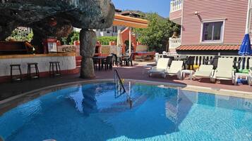 Outdoor pool, pool umbrellas, pool loungers