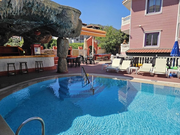 Outdoor pool, pool umbrellas, sun loungers