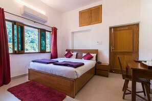 Habitación Deluxe | Sistema de insonorización y ropa de cama