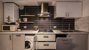 Apartment, 2 Bedrooms | Private kitchenette | Full-sized fridge, microwave, stovetop, dishwasher