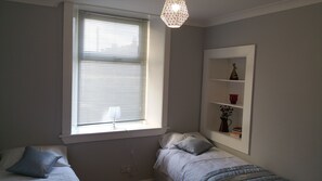 2 habitaciones, tabla de planchar con plancha y wifi gratis