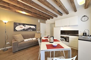Apartment, 2 Bedrooms | Living area | LCD TV