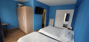 Premium bedding, blackout curtains, free WiFi, bed sheets