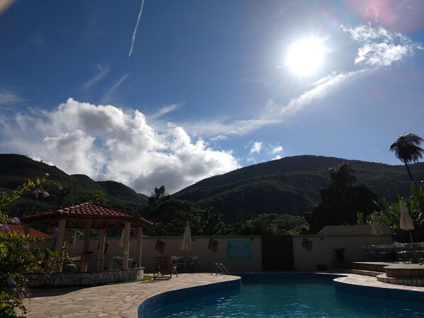 Indoor pool, outdoor pool, open 9:00 AM to 8:00 PM, pool umbrellas