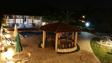 Indoor pool, outdoor pool, open 9:00 AM to 8:00 PM, pool umbrellas