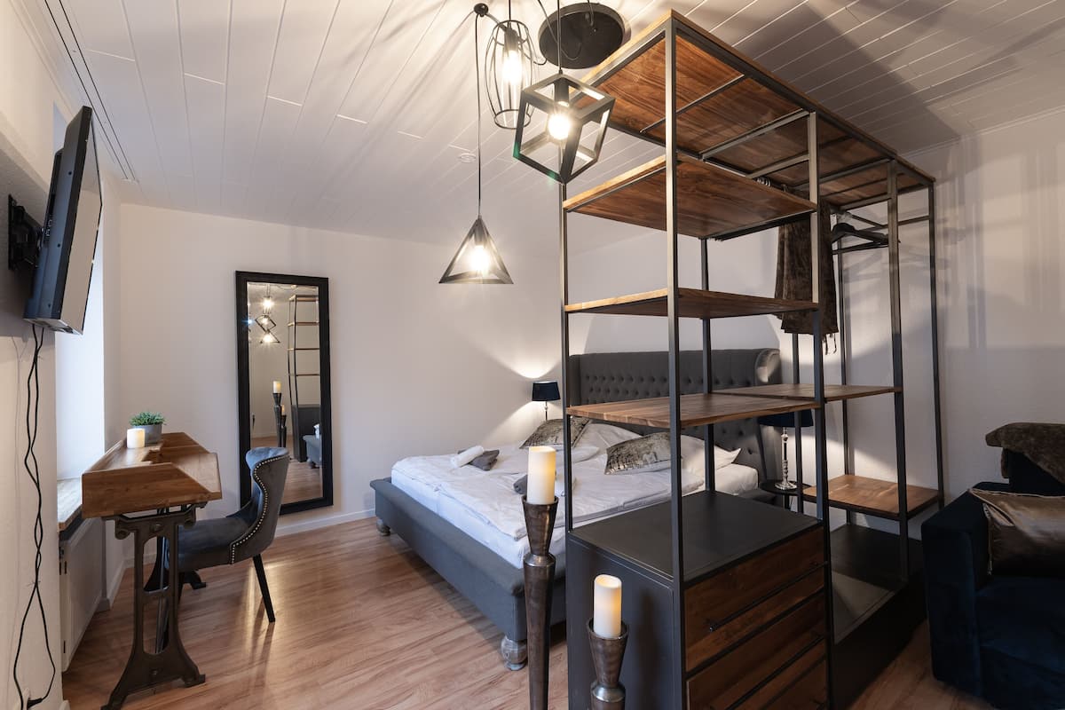 Premium bedding, desk, blackout curtains, soundproofing