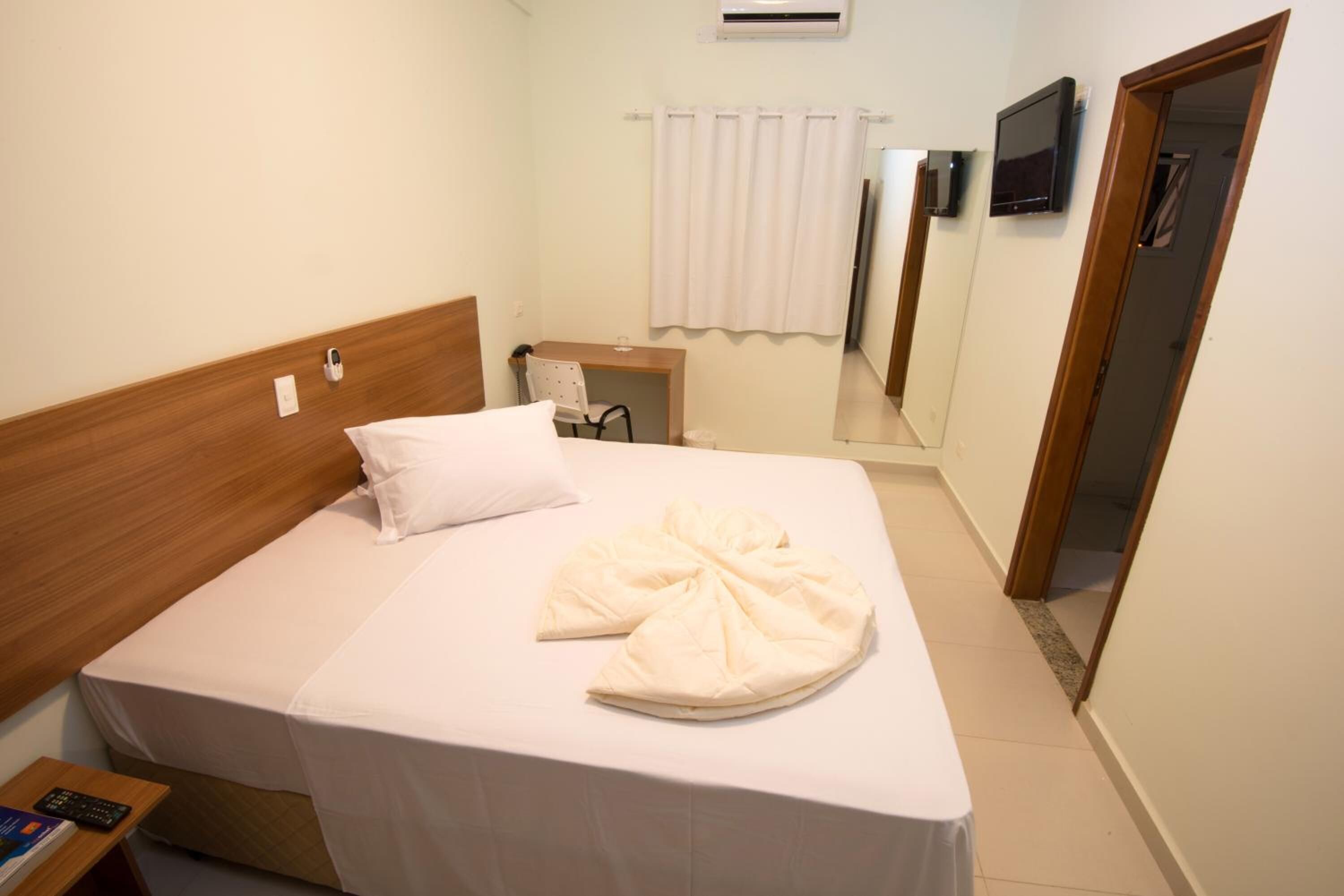 desk, blackout curtains, free wifi, bed sheets