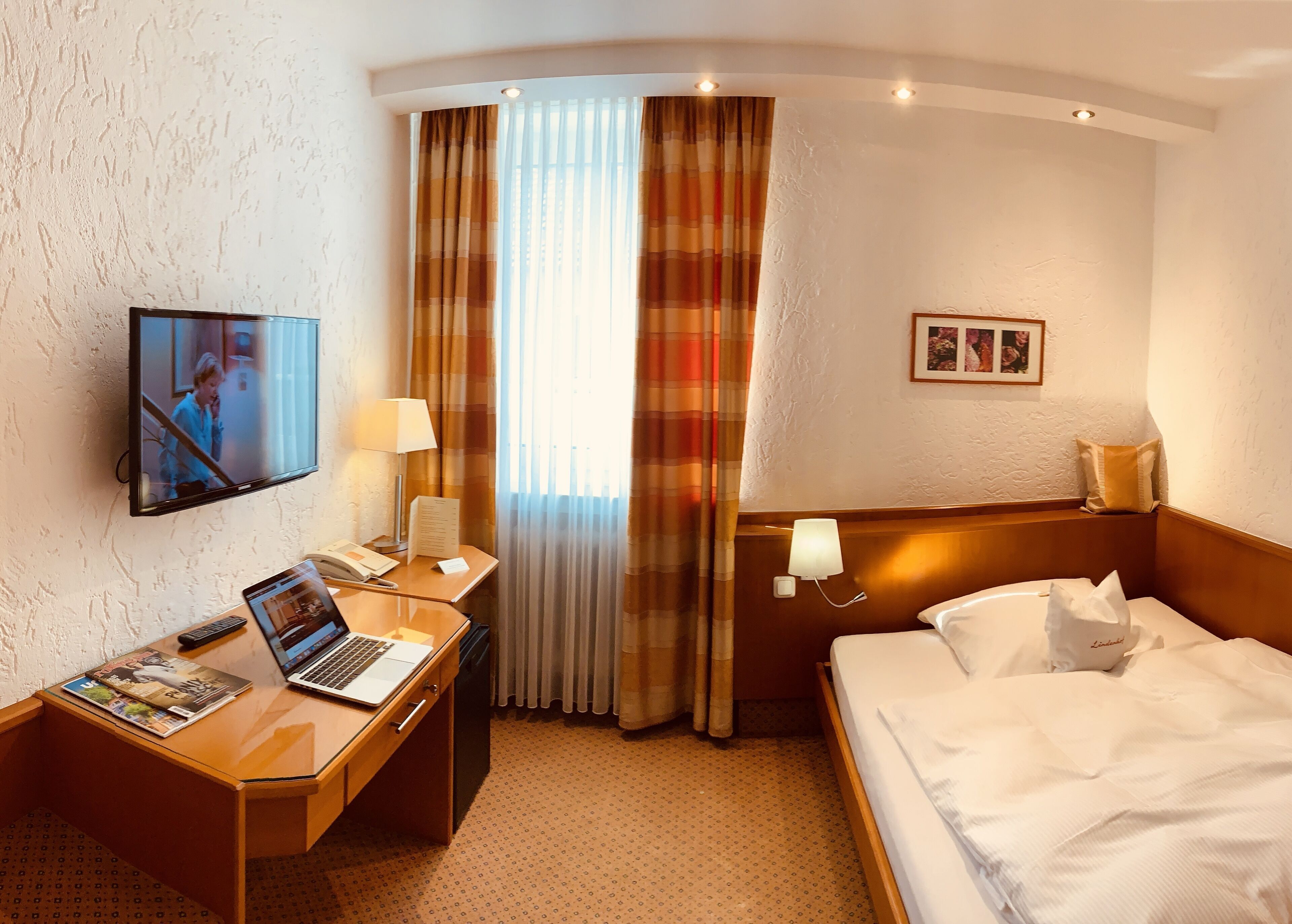 Premium bedding, down comforters, minibar, desk
