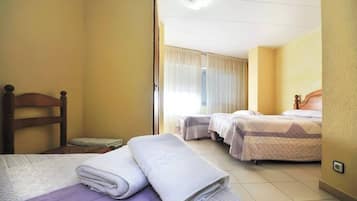 Basic Quadruple Room | 1 bedroom, premium bedding, blackout curtains, free WiFi