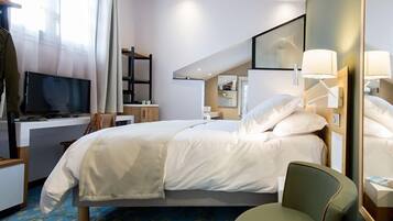 Ropa de cama de alta calidad, minibar, caja fuerte