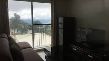 Condo, 2 Bedrooms | Living area | Flat-screen TV