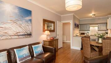 Apartment, Multiple Beds | Living area | TV