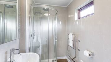 Cabin, 1 King Bed | Bathroom | Shower, hair dryer, towels