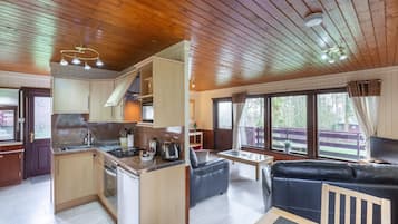 Cabin, 1 King Bed | Living room | TV, DVD player