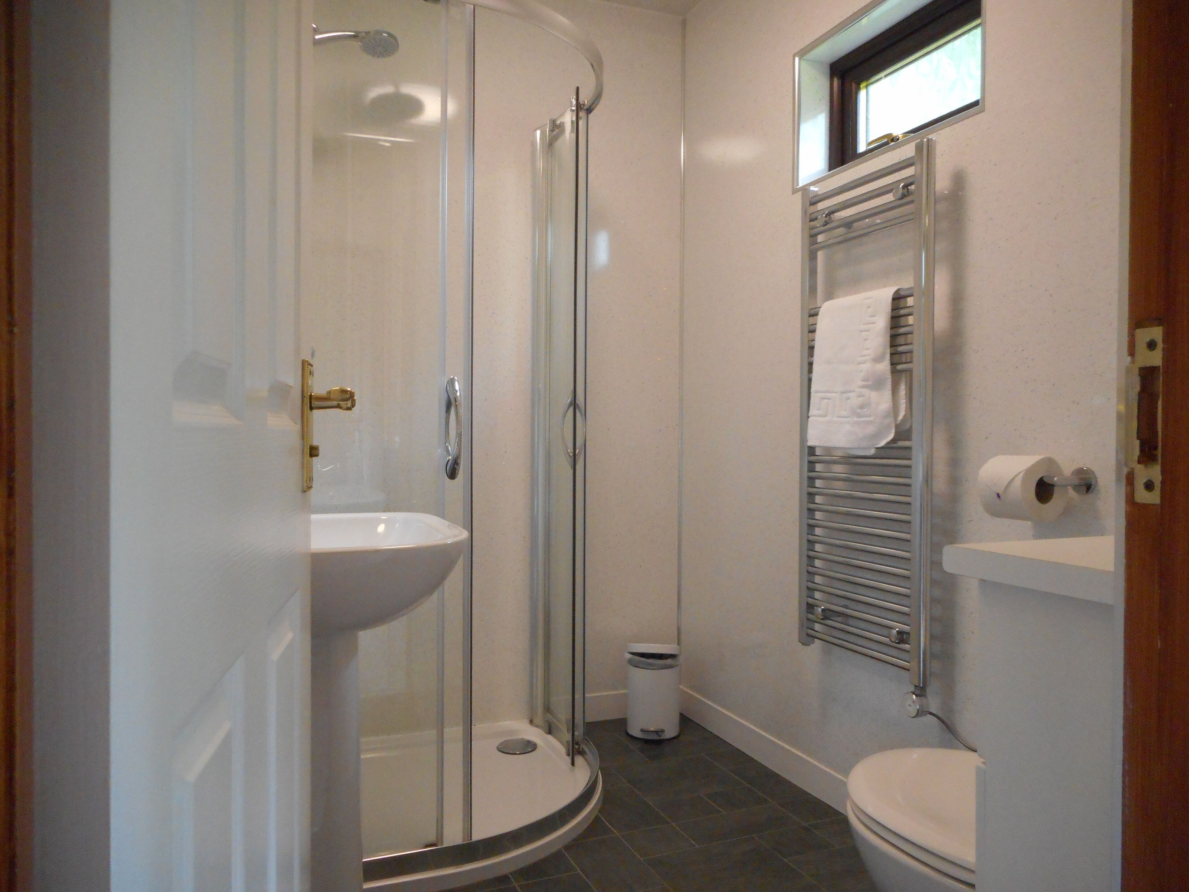 Cabin, 1 King Bed | Bathroom | Shower, hair dryer, towels