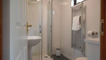 Cabin, 1 King Bed | Bathroom | Shower, hair dryer, towels