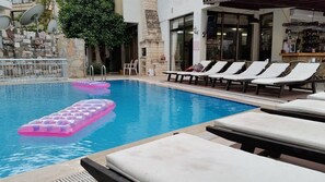 Outdoor pool, pool umbrellas, pool loungers