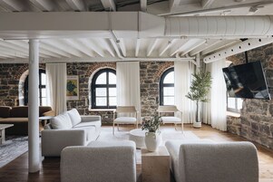 Elite Penthouse, 4 Bedrooms (Unit 3) | Living area | 65-inch flat-screen TV with cable channels, TV, Netflix