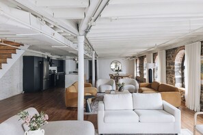 Elite Penthouse, 4 Bedrooms (Unit 3) | Living area | 65-inch flat-screen TV with cable channels, TV, Netflix - Saint Sulpice Lofts by Bakan - Old Montreal (Montreal)