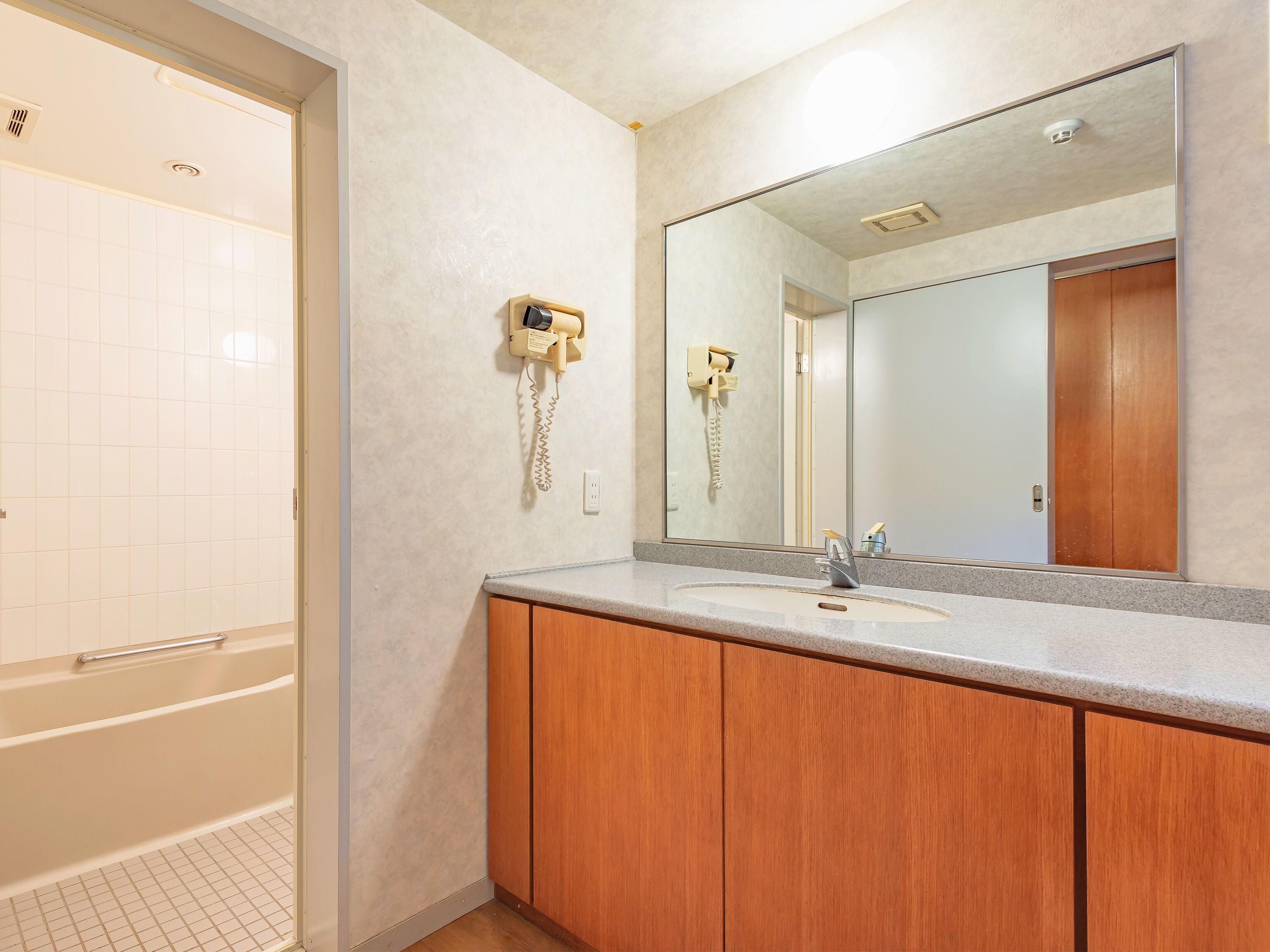 separate bathtub and shower, deep-soaking bathtub, free toiletries