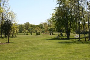 Suite Deluxe, 1 cama de matrimonio grande, bañera de hidromasaje, vistas al campo de golf | Vistas desde la habitación