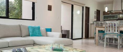 Design Condo, 2 Bedrooms, Pool View | Living area | TV