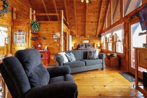 TV, fireplace - Log cabin- sleeps 4 with hot tub, Smoky Mtn views, game room, and jacuzzi tub! (Sevierville)