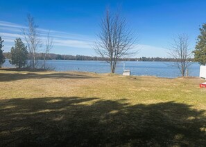 Property grounds - Waterfront cottage in Elk Rapids on Bass Lake. Firepit, dog ok (Elk Rapids)
